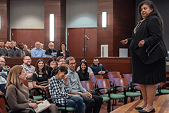 Weikel speaker Ann Mukherjee infront of an audience