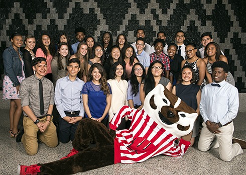 The inaugural BEL Program scholars spend some time with Bucky Badger at Grainger Hall.