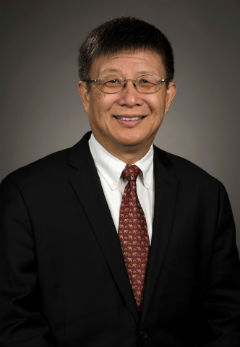 Vertical portrait of Professor Yongheng Deng