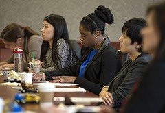 Zena Stephens (MBA ’17) takes notes during remarks by Mark Esselman during the HR Summit this spring.