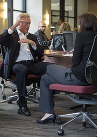 Two alumni who were featured speakers at the HR Summit, Bill Mateikis (M.S. ’85) and Jordana Kammerud (M.S. ’00), work as partners during the coaching seminar at the HR Summit this spring.