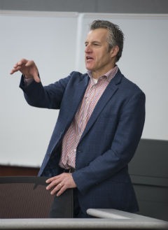 IBM client executive Bob Warpinski coaches students