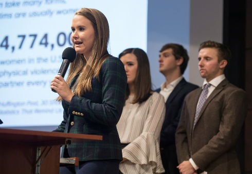 Student Hannah Ripkey presents during Big Event