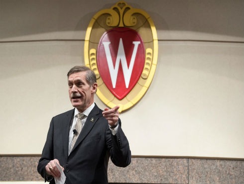 Army Official Karl F. Schneider speaks to the audience in the Plenary