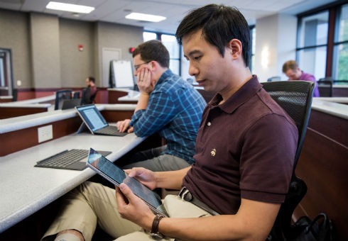 Evening MBA student Matt Su uses his Surface tablet