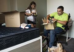 Thiel unpacking a box