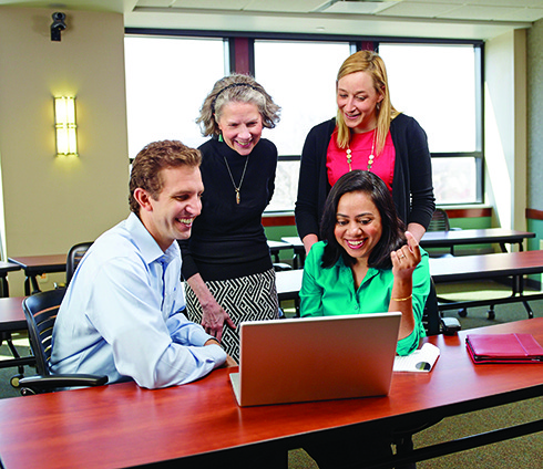 Joan Schmit with students