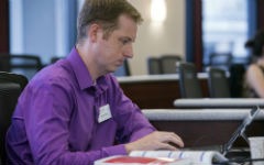 A student concentrates while using a Surface tablet