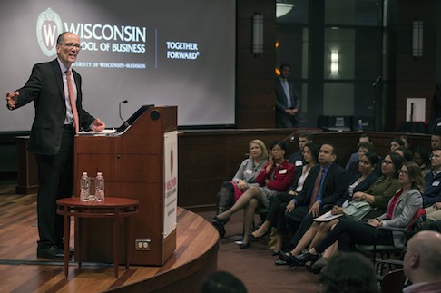 U.S. Secretary of Labor Tom Perez speaks in front of group at Wisconsin School of Business
