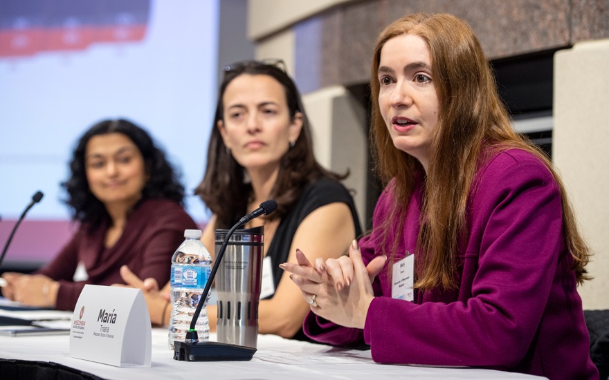 Maria Triana speaks during a panel presentation