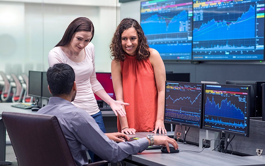 Three students in Finance and Analytics Lab