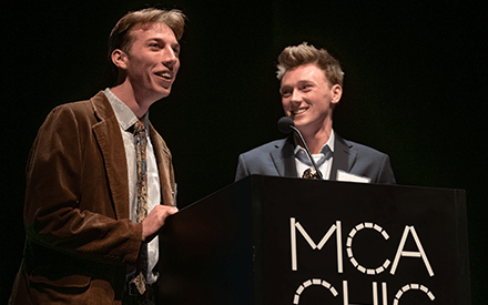 WSB students David Smith and Chase Devens give an acceptance speech after winning a study abroad film festival.