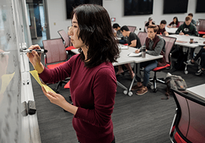 Professor Yang Wang teaches students in an active learning classroom