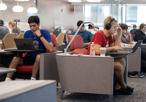 Business students study quietly in the Learning Commons