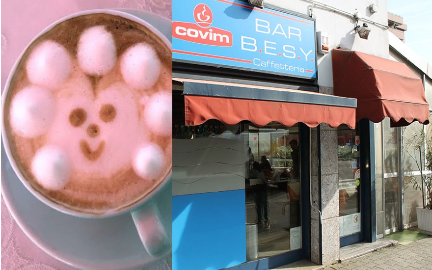On the left: a latte with a smiley face in the milk art. On the right: BAR B.E.S.Y. Caffetteria storefront.
