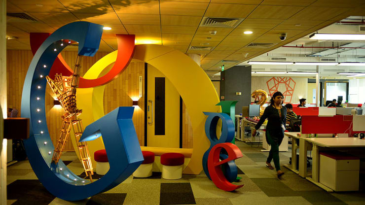 Large letters spelling Goggle in a room