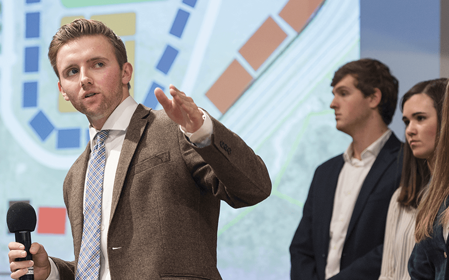 Business students make a real estate presentation