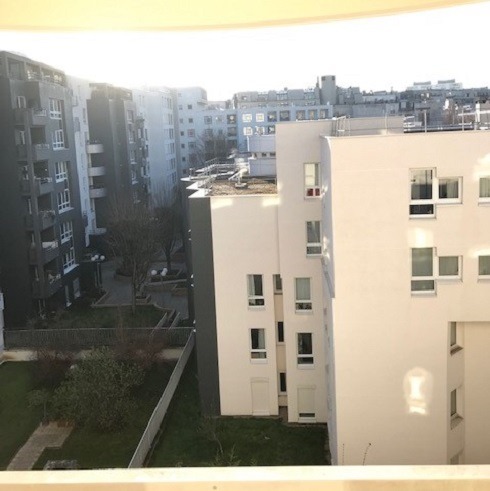 View of courtyard and apartment buildings