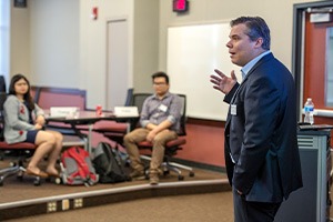 Professor Dani Bauer welcoming students