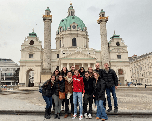 My friends and I standing in front of Karlskirche