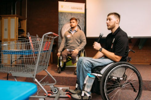 Two men speaking at The Assistive Technology Challenge