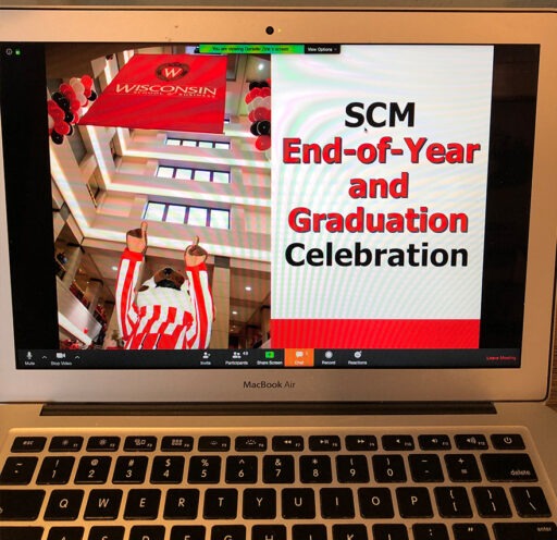 Laptop with "SCM End-of-Year and Graduation Celebration" displayed