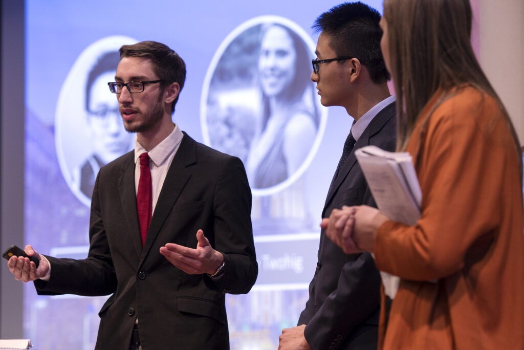 Students presenting at the Hult Prize competition