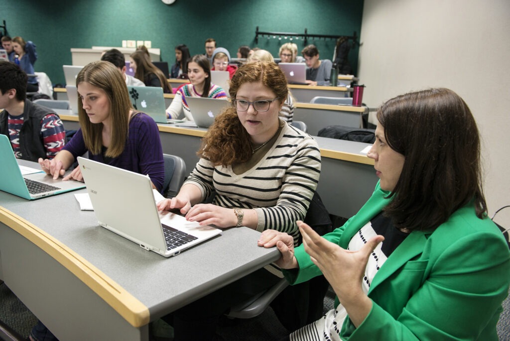 Student receiving help from Professor Krueger