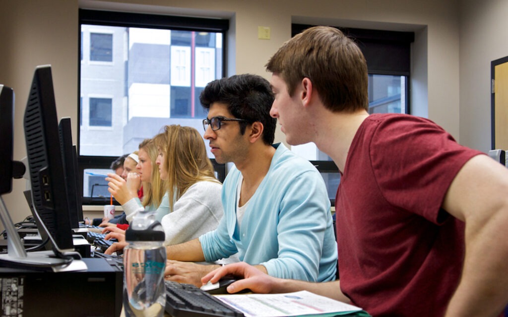 students seated at computers