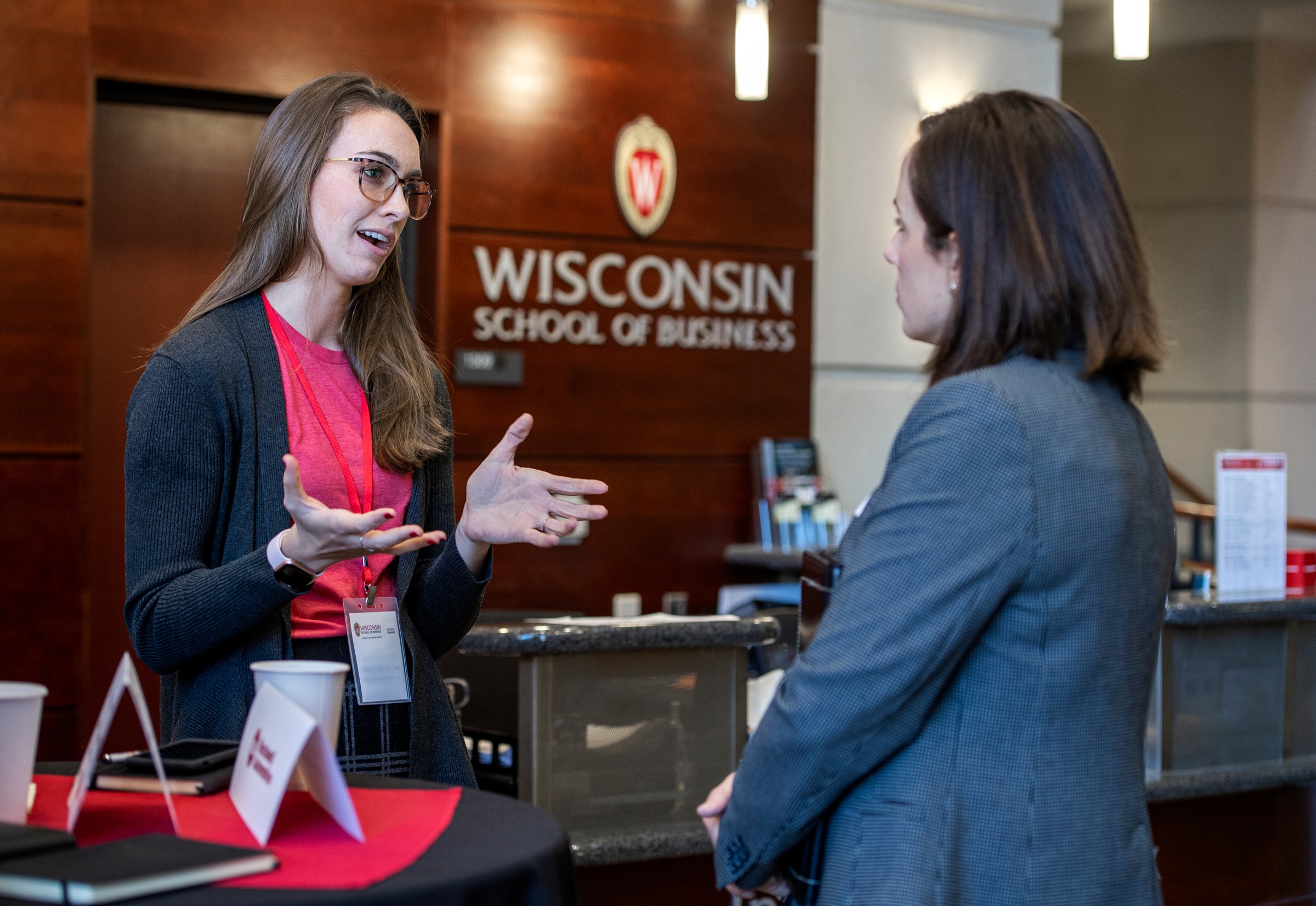 Two women talking at Sixth Annual Corporate Connections Social event