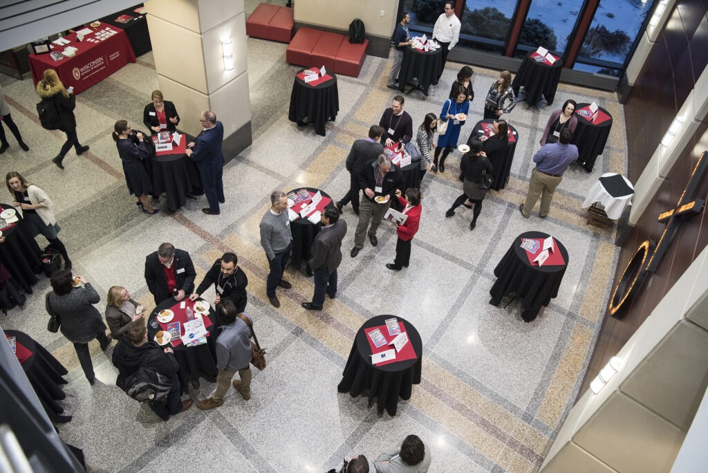 aerial view of students at tables during corporate connections