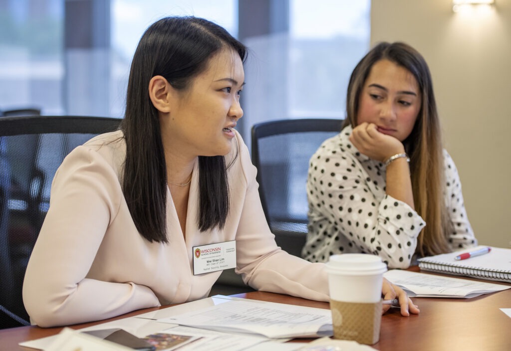 2 women participating in orientation