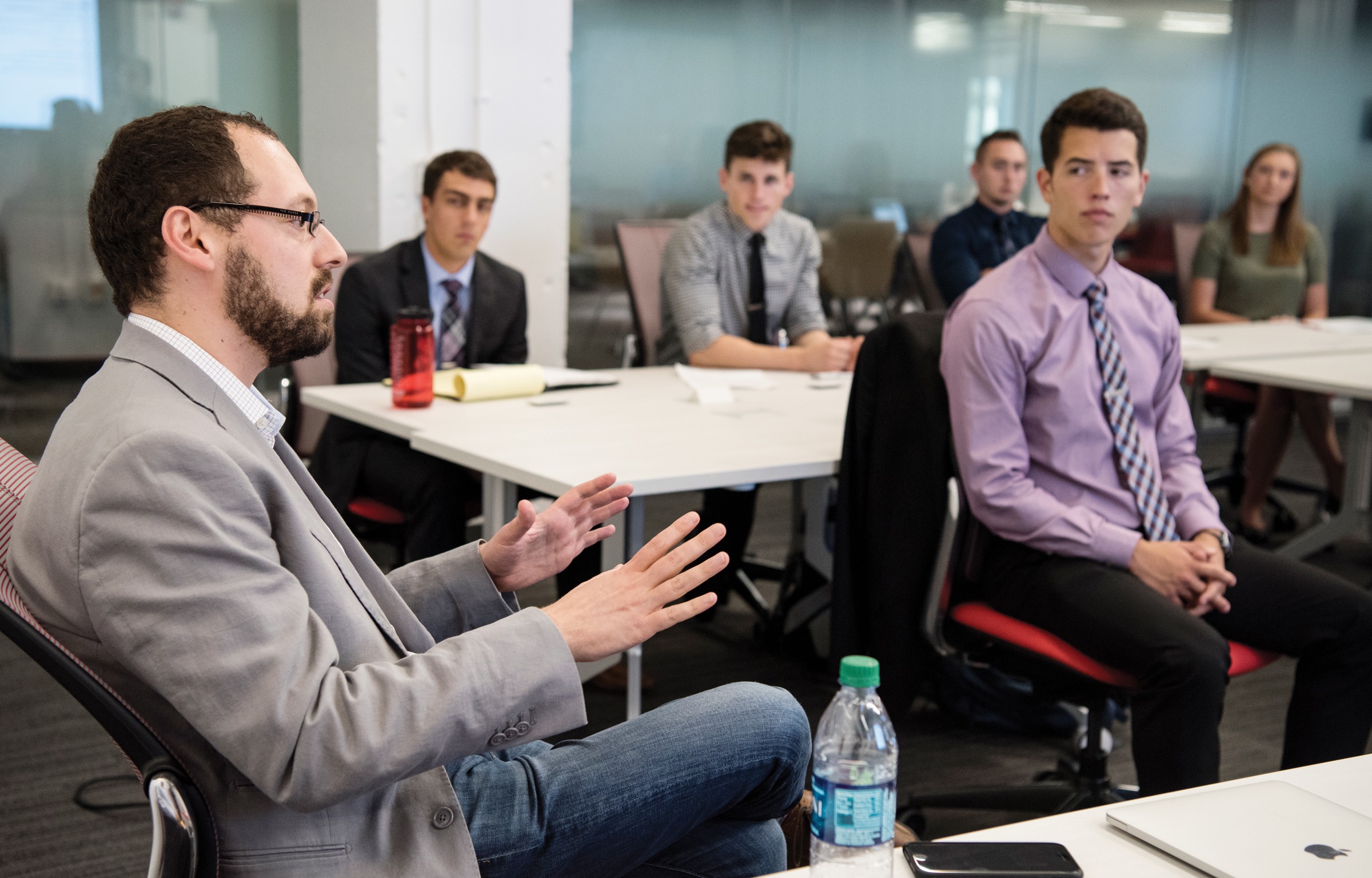 Students listening to a presentation