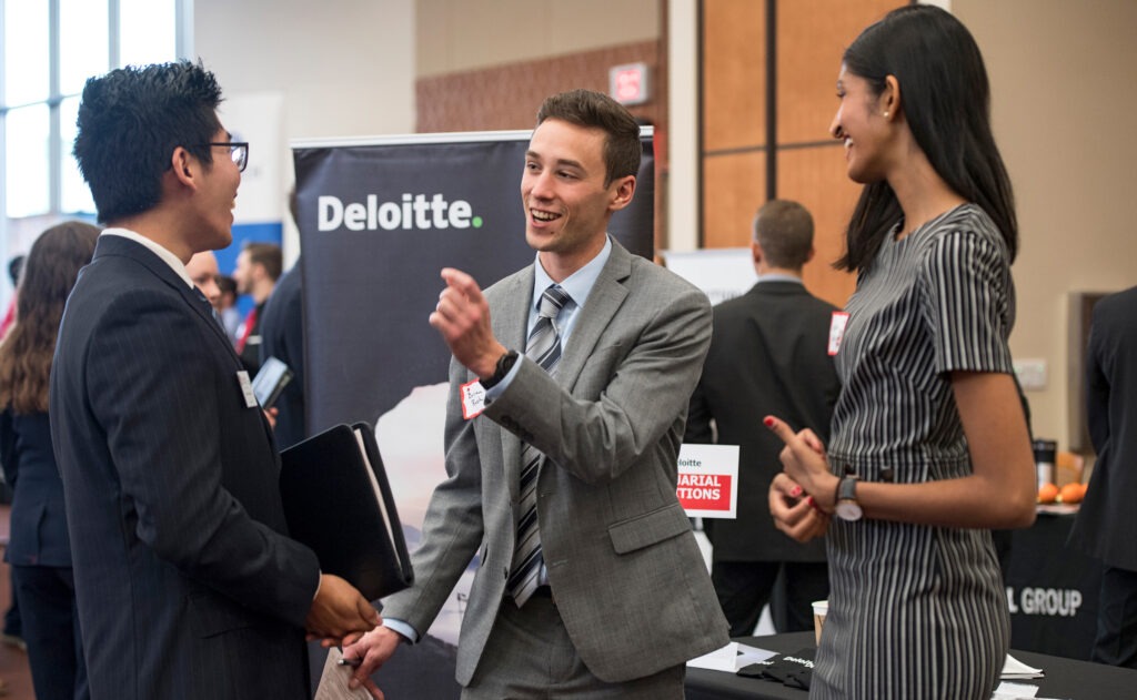 Students talking at a career fair