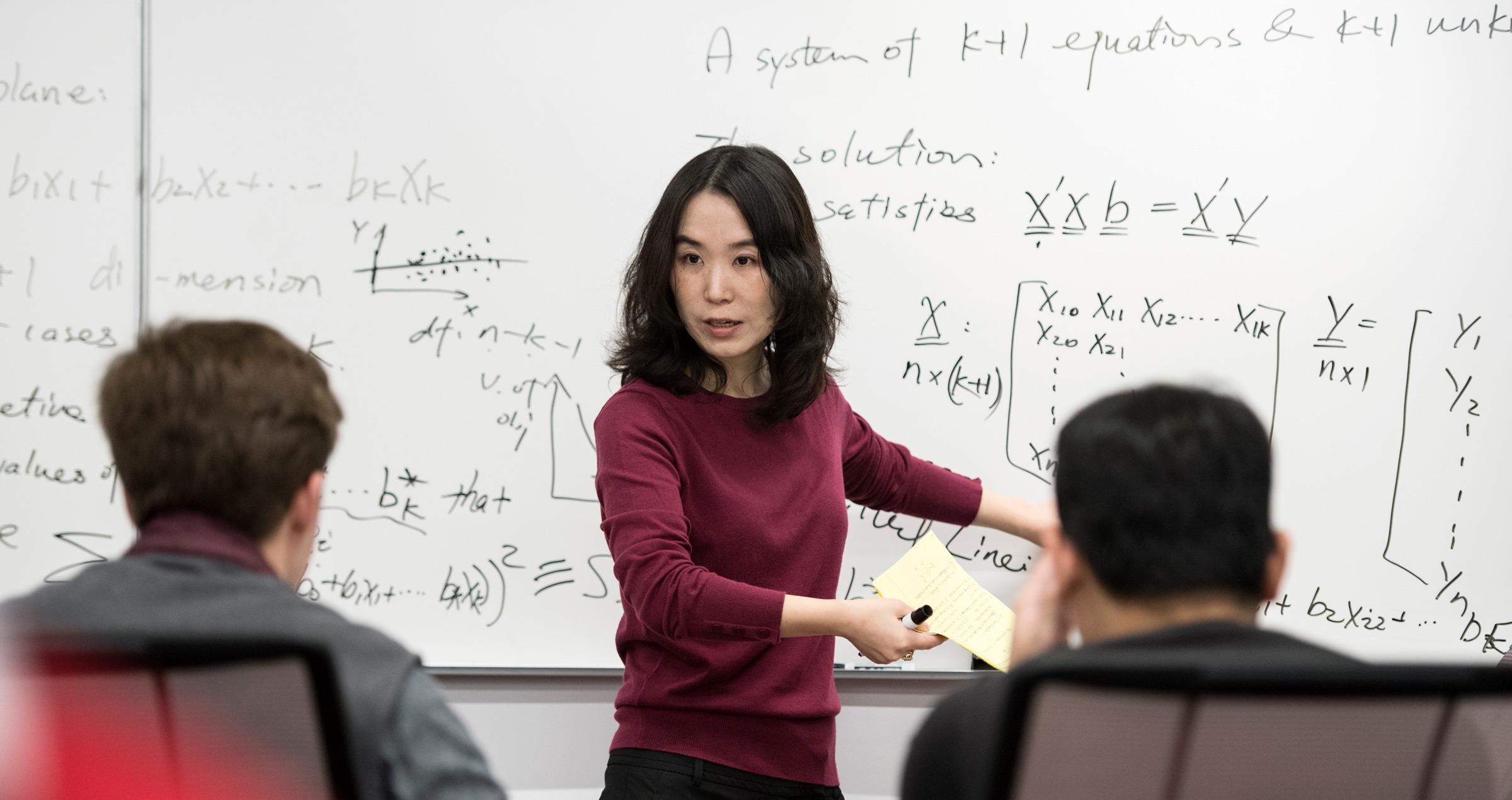 Professor Yang Wang teaching a class