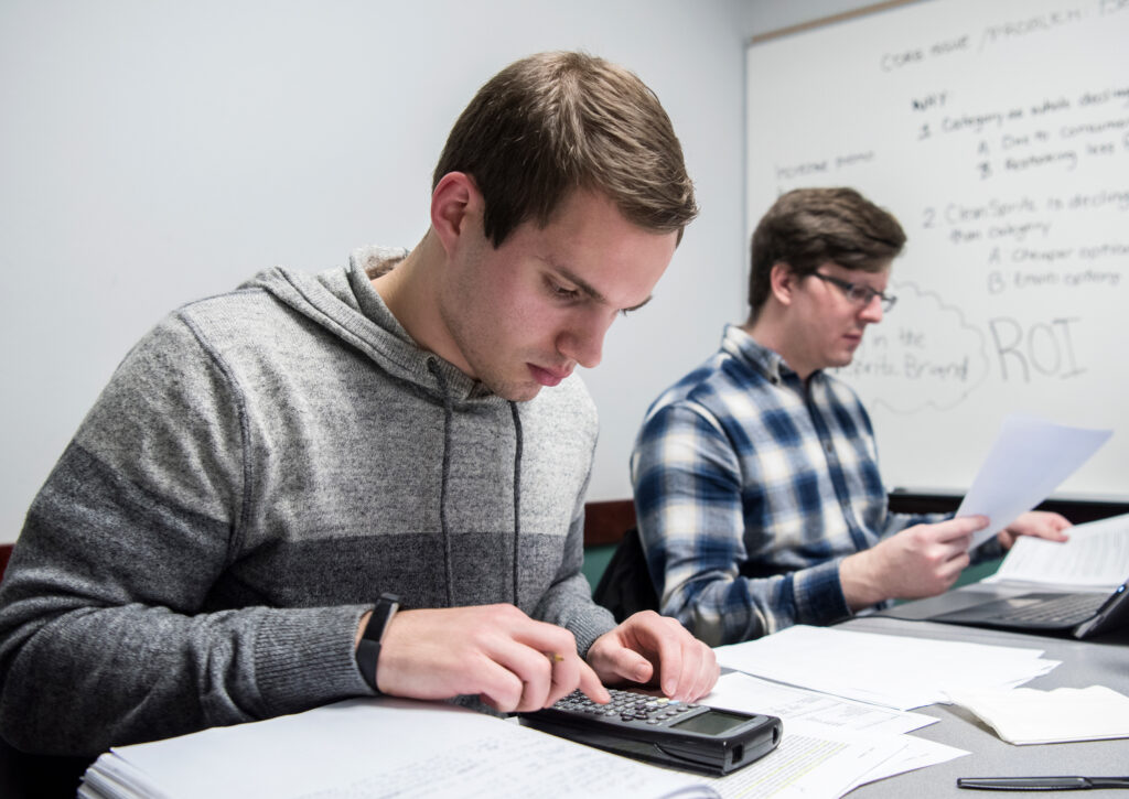 Two students working in study room