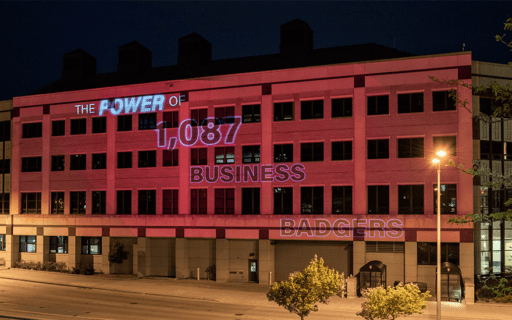 Grainger Hall with "The Power of 1,087 Business Badgers" on it