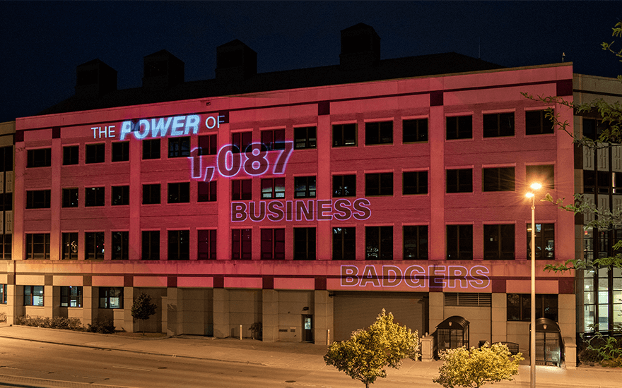 Grainger Hall with "The Power of 1,087 Business Badgers" on it