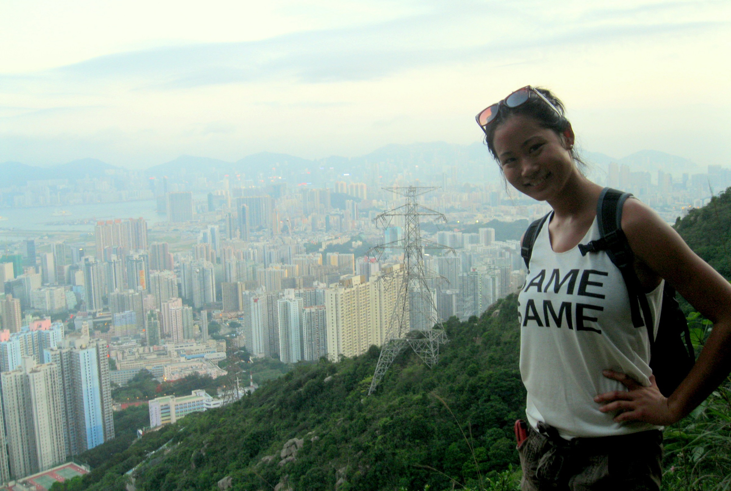 Student next to view of Hong Kong
