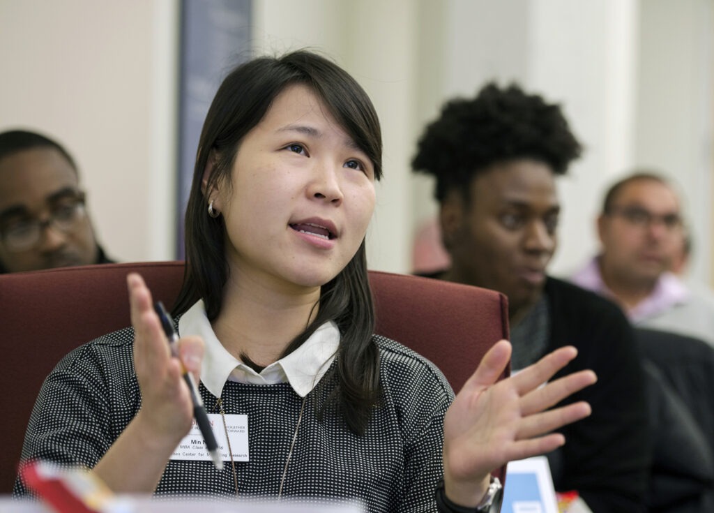 MBA student speaking during a class