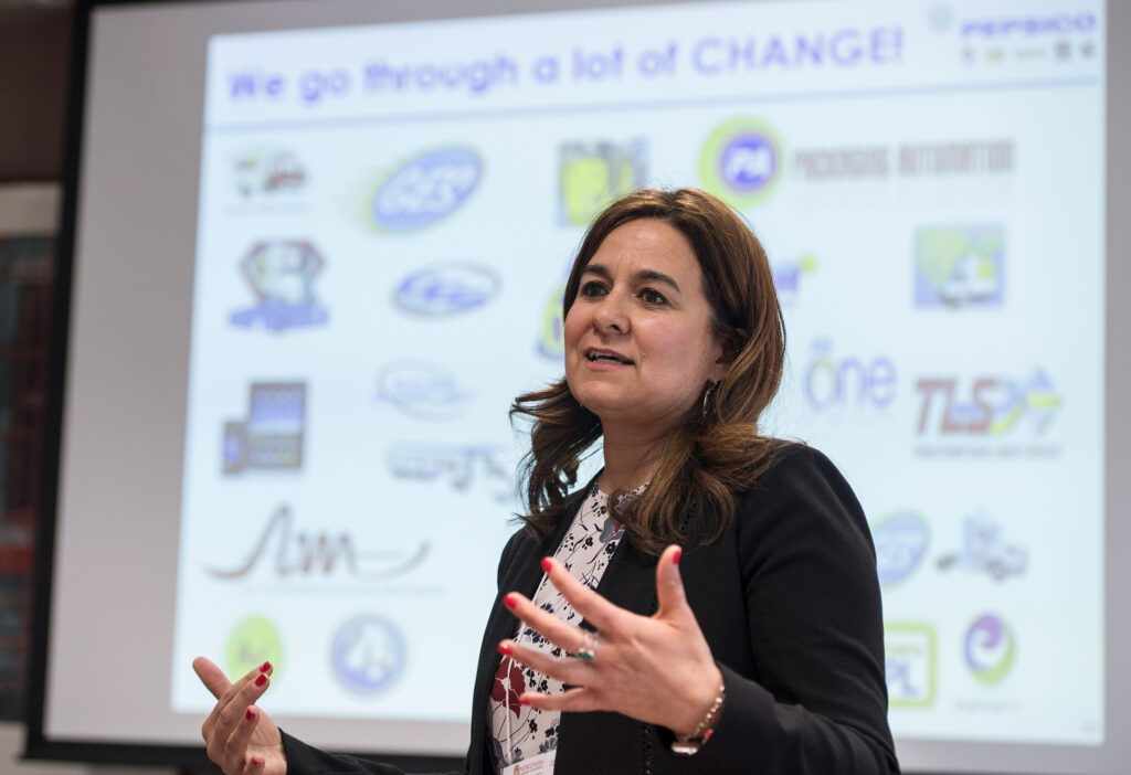 Woman speaking at a conference