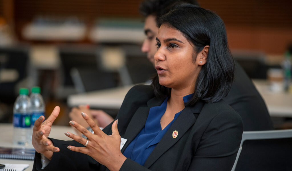 woman speaks at advisory board meeting