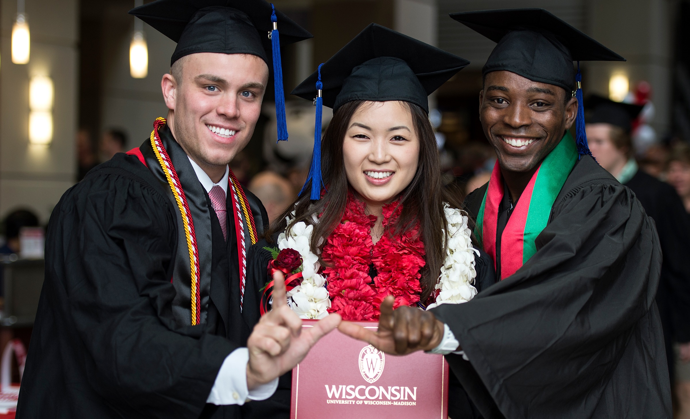 Graduating students taking a group photo