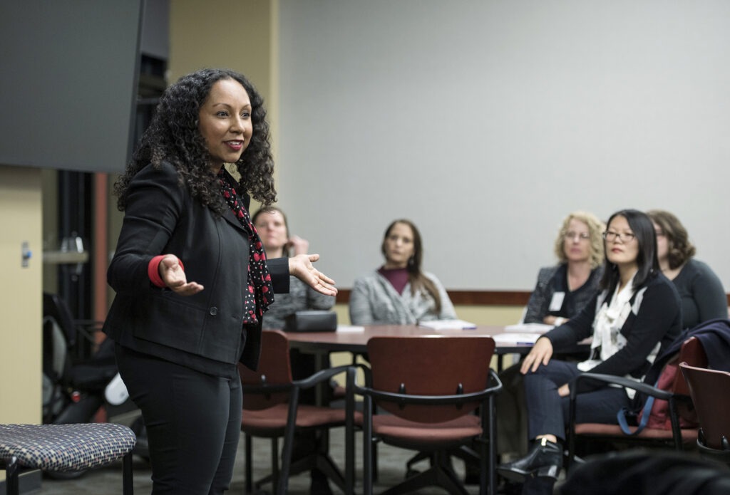 Weikel speaker Deanna Singh (MBA '12) speaks to a host of women MBA students