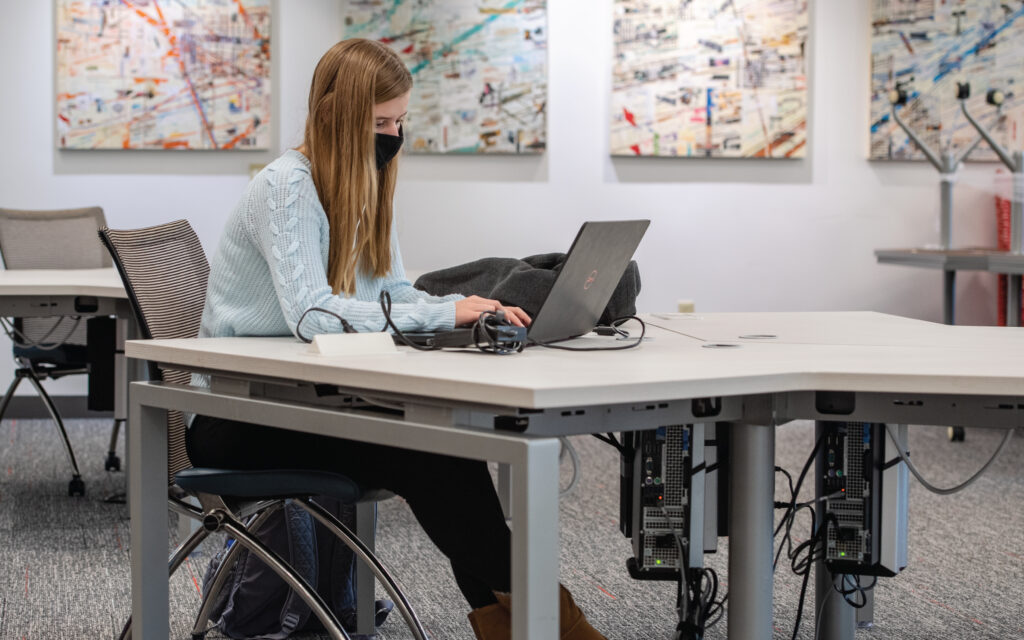 Student working on their laptop