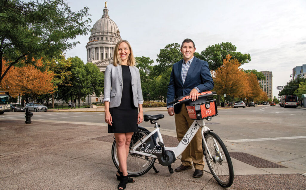 Morgan Ramaker and Brian Conger with a BCycle