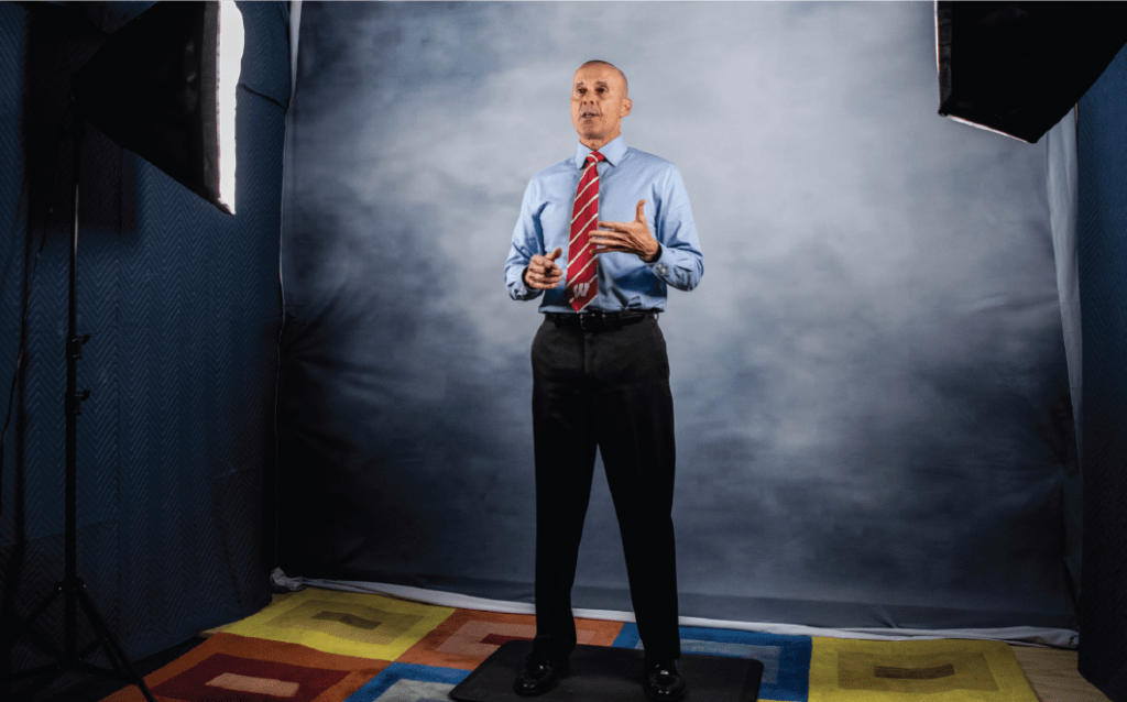 Mark LaPlante recording online lectures from a makeshift studio in his Grainger Hall office.