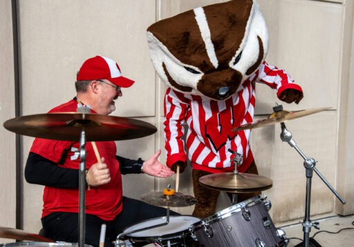 Bucky Badger playing the drums