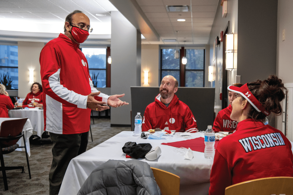 Dean Sambamurthy talking with alumni