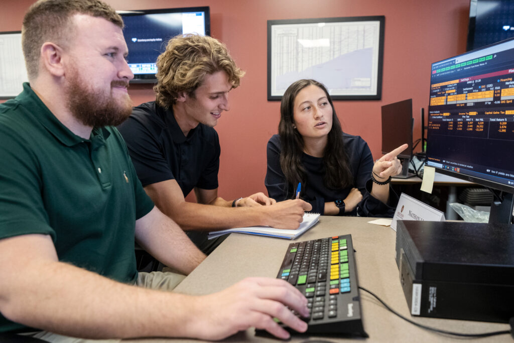 Students looking at computer screen